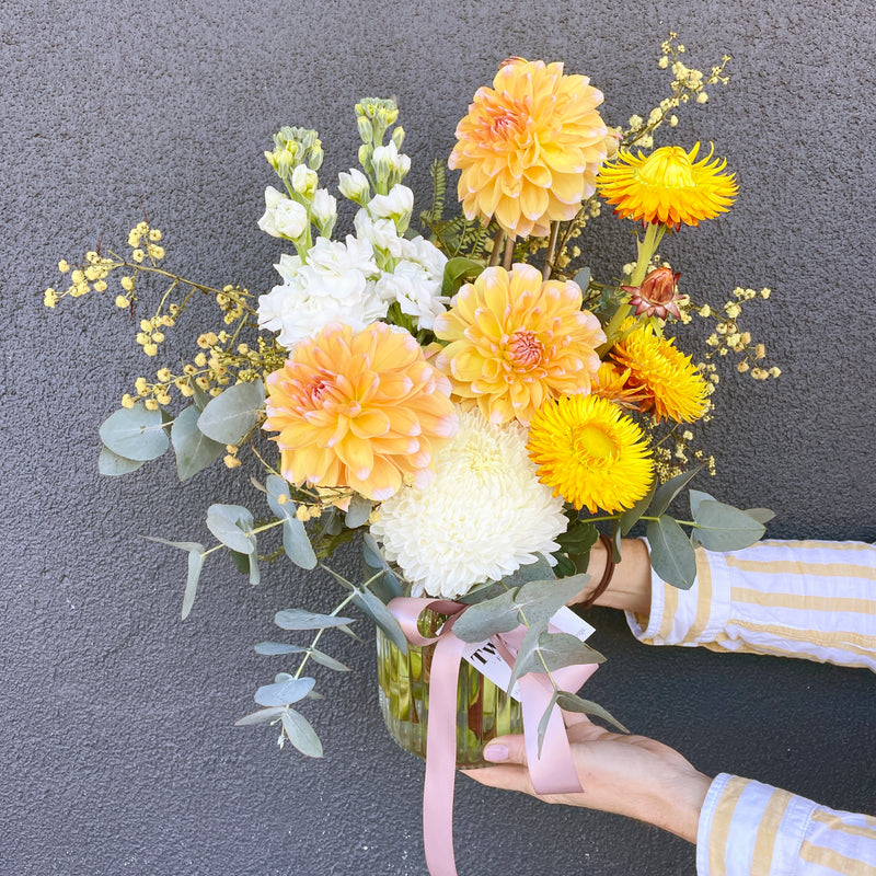 Oranges, Yellows and white Jar of Seasonal Flowers