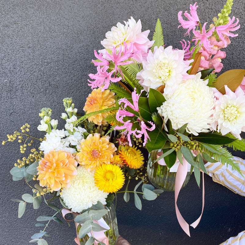 two Jar of Seasonal Flowers